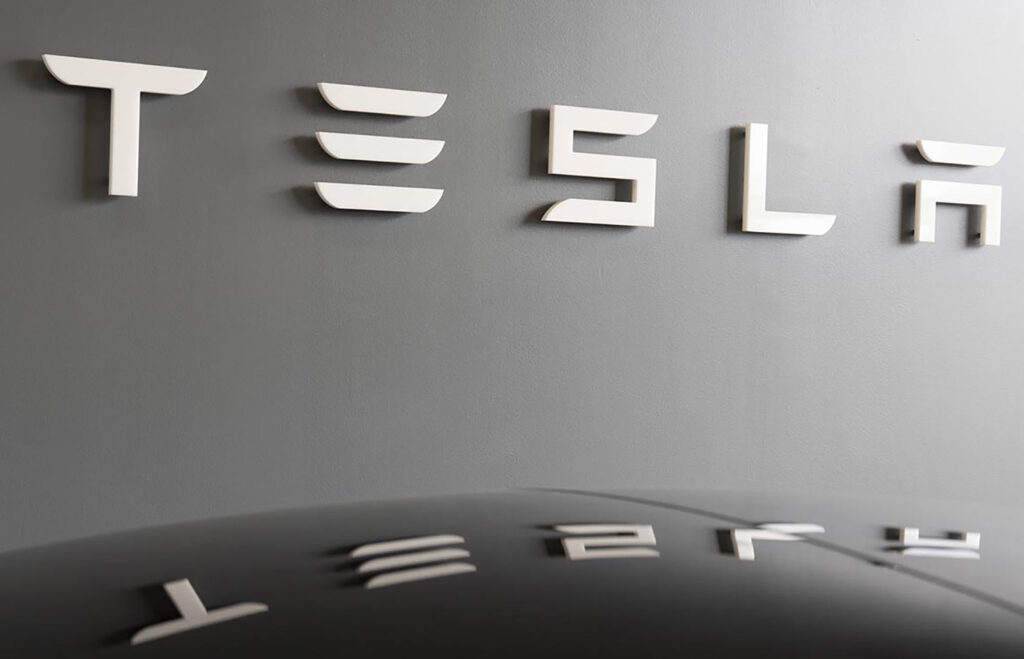 Bordeaux , Aquitaine / France – 11 25 2019 : Tesla sign at car d